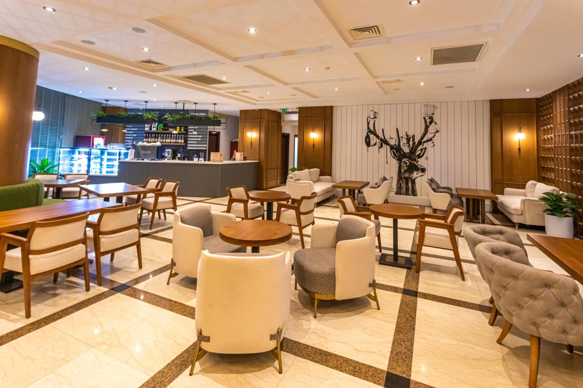 Grand Hotel Victory Aktau  Exterior foto The lounge at the airport