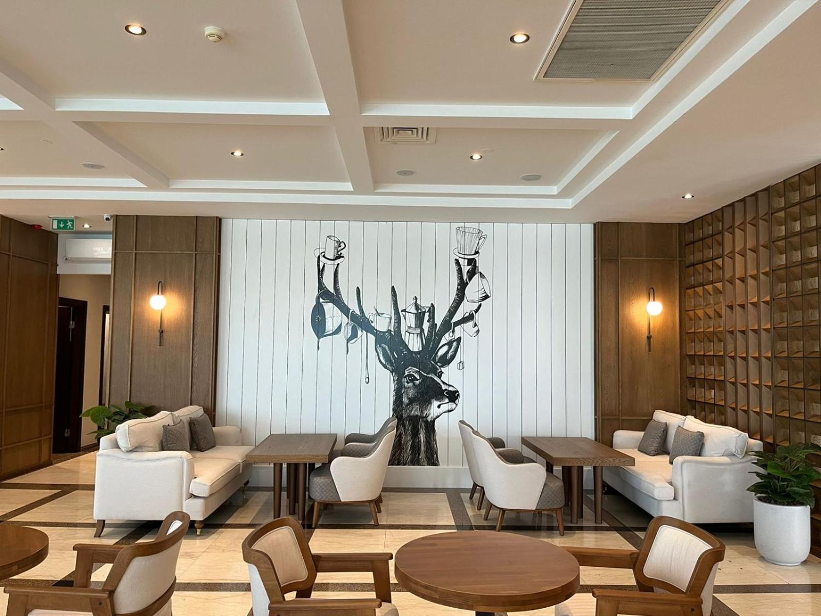 Grand Hotel Victory Aktau  Exterior foto The lounge at the airport