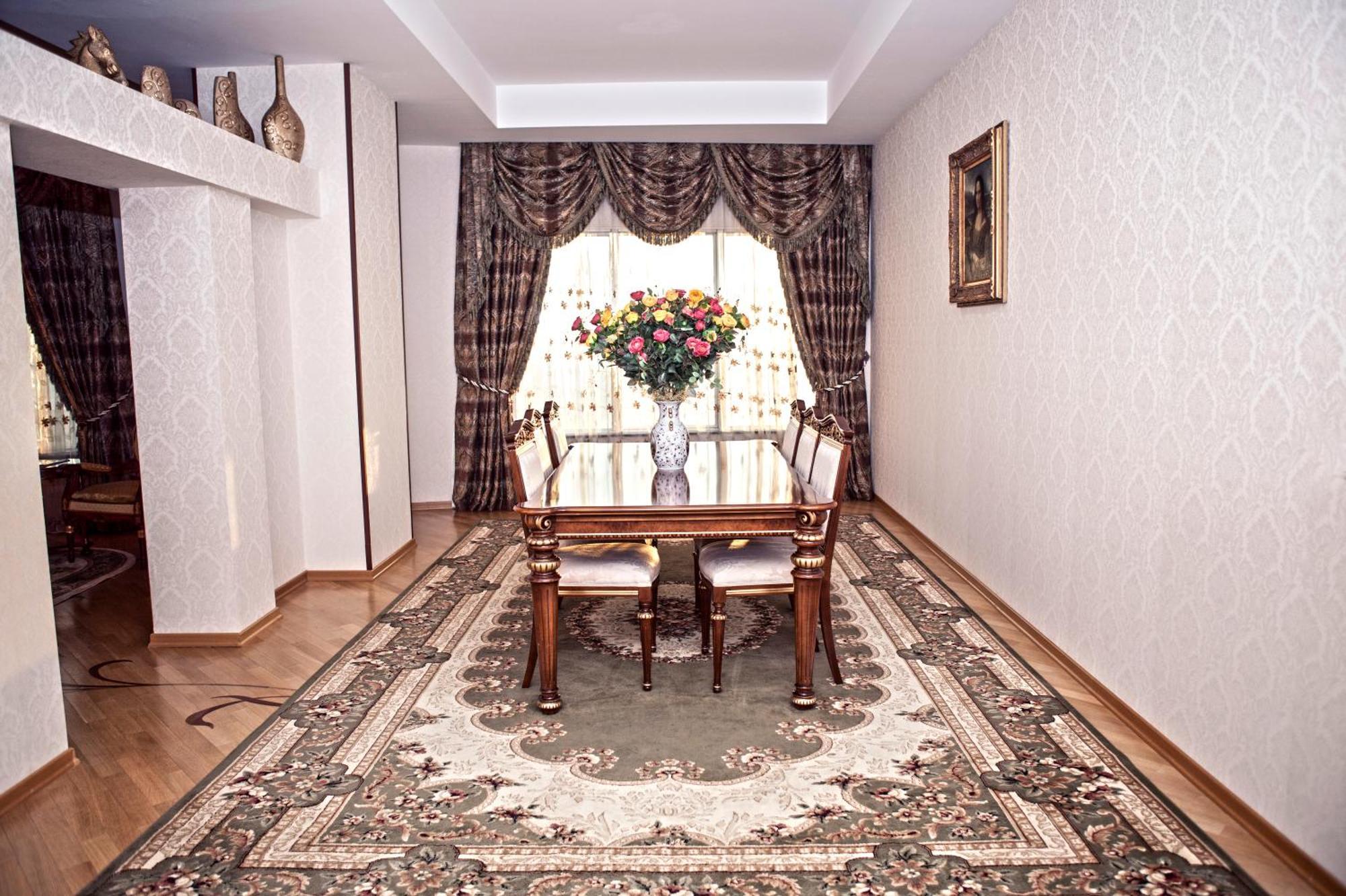 Grand Hotel Victory Aktau  Exterior foto A dining room